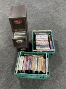 A leather four drawer storage chest together with two boxes of DVD's
