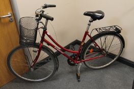 A lady's Kildemoes hybrid bike with front shopping bike