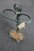 A cast iron stick stand