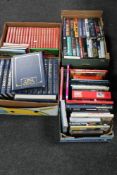 Four boxes of hard backed books - John Gresham, reference, stamp album,