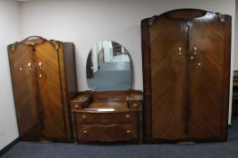 A three piece 1930's walnut bedroom suite.