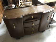 A 1930's oak shaped front sideboard.