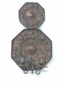 An early copper and brass wall sconce,