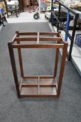 An Edwardian mahogany stick stand.