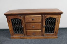 A sheesham wood double door sideboard