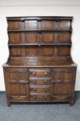 An Ercol elm double door kitchen dresser.