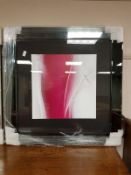 A framed print of a flower,