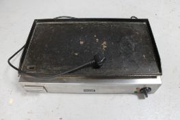 A Lincat stainless steel griddle.