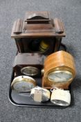 A tray of inlaid mahogany and walnut eight day mantel clock, mid century alarm clocks,