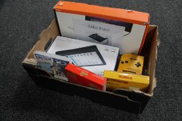 A box containing Nintendo game boy yellow, Super Mario Land and Mario Land II,