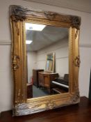 A gilt framed mirror,