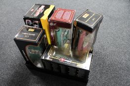 Five boxed large scale die cast vehicles including Burago Jaguar E-Coupe,