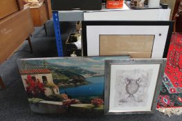 A draughtsman's drawing board, framed prints,