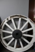 An antique cart wheel