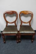 A pair of Victorian mahogany balloon back chairs