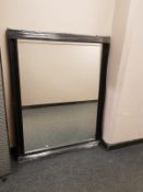 A black framed overmantel mirror,