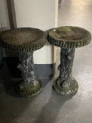 Two concrete tree stump bird baths