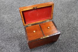 A Victorian mahogany tea caddy