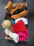 A box of four pairs of lady's ankle boots, wool hats, coats,