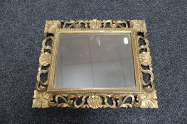 A Victorian decorative gilt framed mirror, height 42cm,