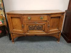 An Arts & Crafts oak sideboard,