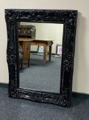 A Victorian style black framed overmantel mirror