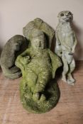 Four concrete garden figures - man seated,