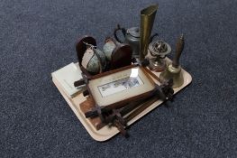 A tray containing antique pewter teapot, brass hand bell, fluted vase and armillary sphere,