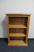 A set of pine open bookshelves,
