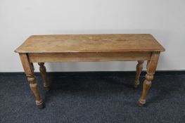 An antique pine side table