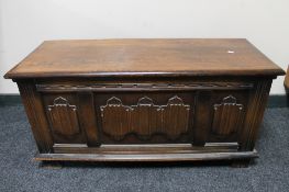 An oak linen fold blanket box 47 cm x 95 depth 38 cm