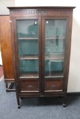 An Edwardian mahogany double door display cabinet