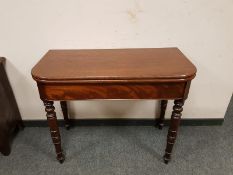 A 19th century mahogany tea table,
