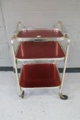 A three tier metal tea trolley