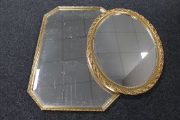A hexagonal gilt framed bevelled mirror together with an oval gilt framed mirror