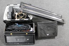 A Lamey CX amplifier together with two boxes of assorted stage lighting and cables