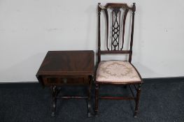 An antique chair together with a Regency style sofa table