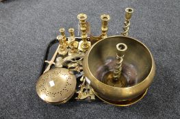 A tray of antique and later brass ware, planter, candlesticks, chestnut roaster,