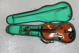 A 20th century violin and bow in carry case CONDITION REPORT: Back 14