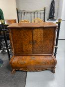 A reproduction walnut effect Dutch style TV cabinet