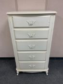 A Laura Ashley cream five drawer chest,