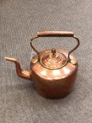 A Victorian copper kettle