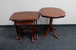 A nest of three inlaid tables and a matching wine table