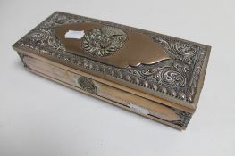 A silver embossed table box stamped .