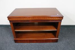 A mahogany two tier audio stand