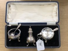 A silver three piece cruet set, London 1972, boxed.