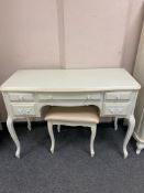 A Laura Ashley cream dressing table,