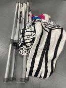 A folding metal gazebo with cover and bag of accessories