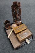 A tray of Eastern carved trinket boxes, letter rack, figure,