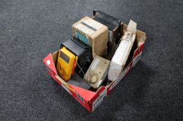 A box of six electrical meters and testers